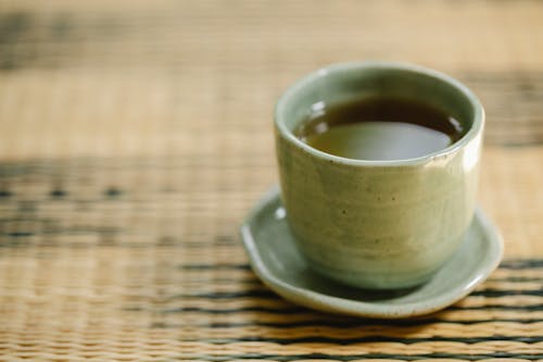 Free Cup of aromatic tea in ceramic cup Stock Photo