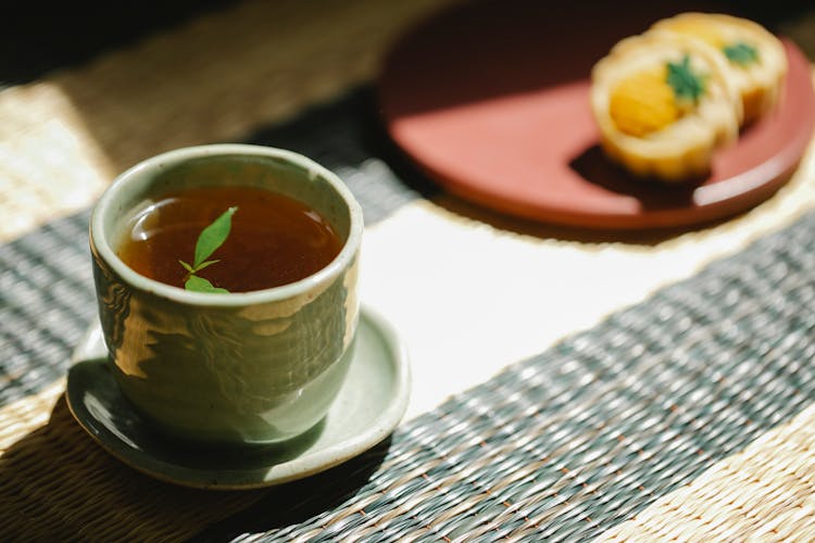 Cup Of Tea With Fresh Mint On Table