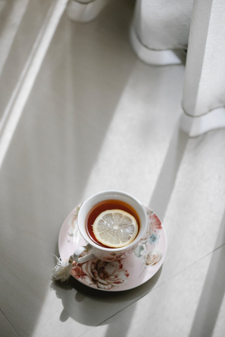 Hot Tea With Lemon Near Window