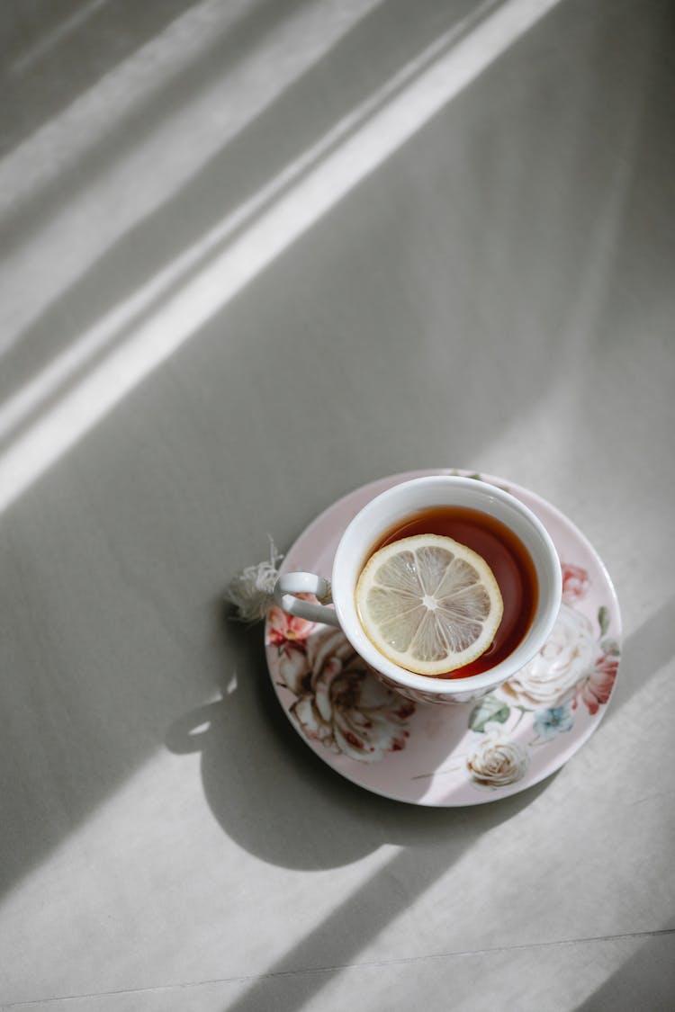 Teacup With Hot Drink And Lemon