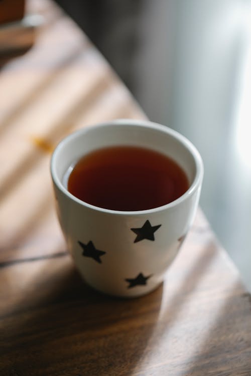 Free Hot tea in cup on table Stock Photo