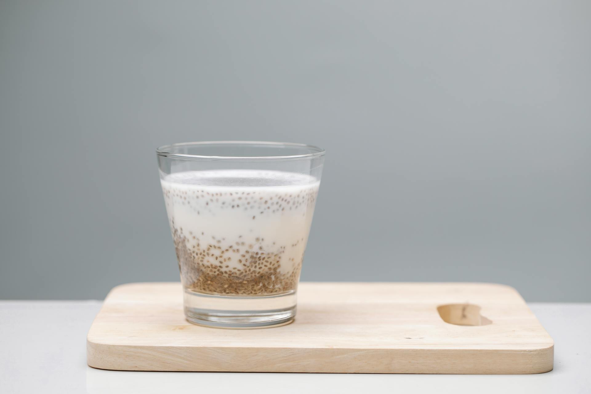 Glass of tasty pudding with chia seeds