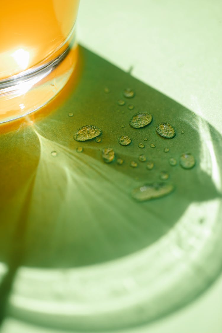 Water Drops Near Glass Of Drink