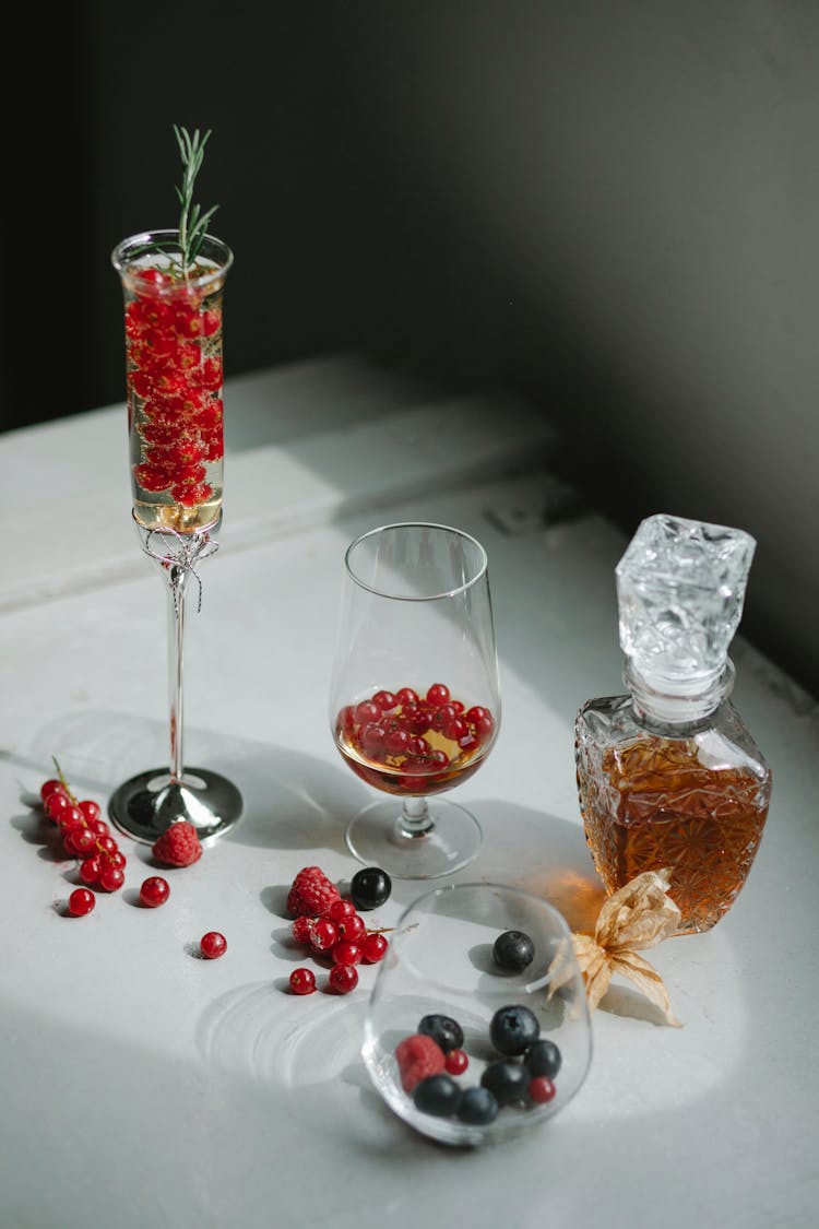 Glasses With Berries And Jug With Drink