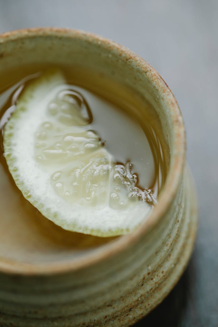 Drink With Lemon In Cup