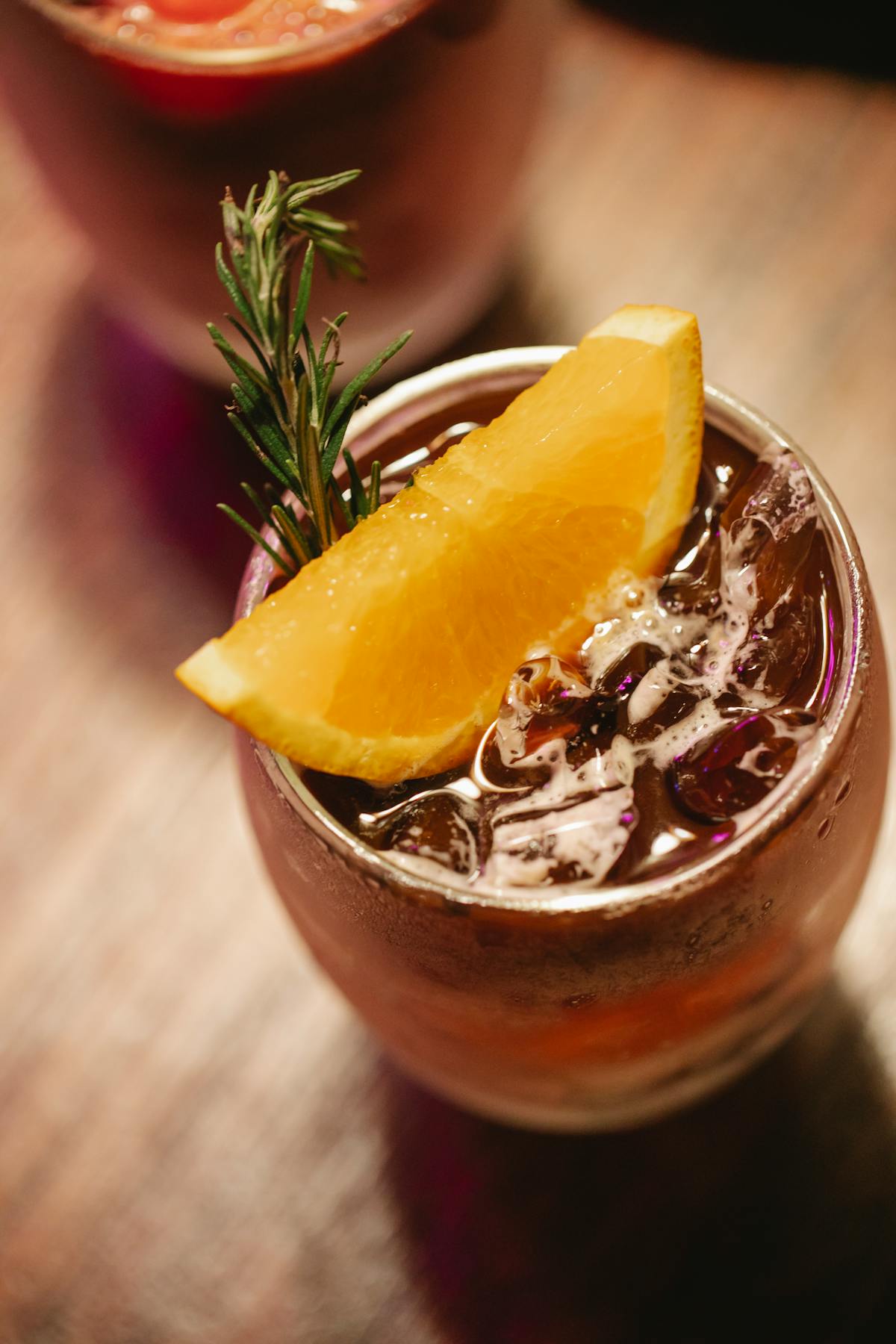 Neatly arranged stationery and planner on a wooden desk