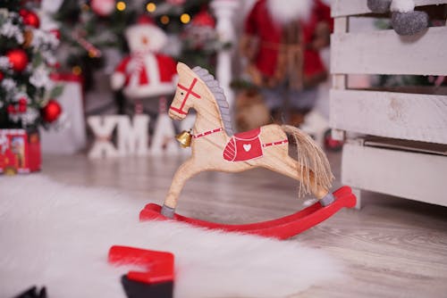 Close-Up Shot of a Wooden Horse Figurine