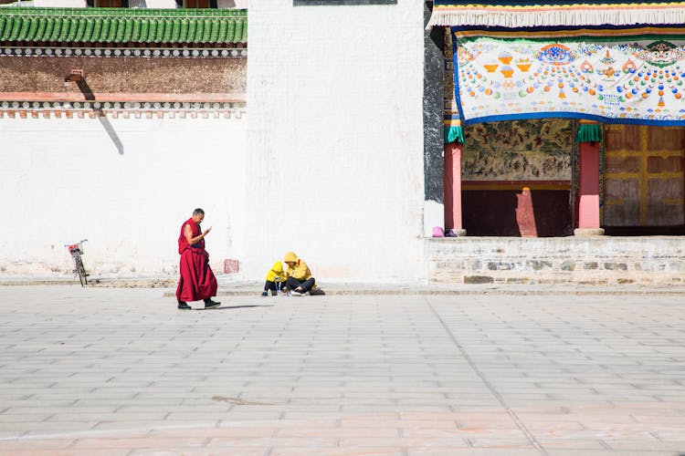 Monk Walking On A Street