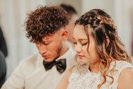 Loving ethnic newlyweds on wedding