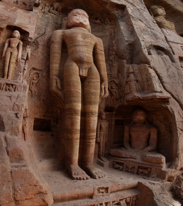 Jain Sculptures On A Stone Wall