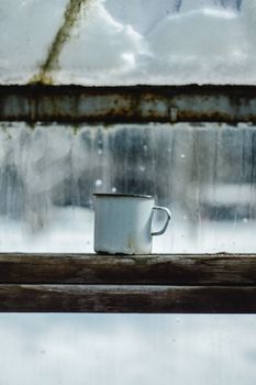 Enamel Mug on the Window Sill