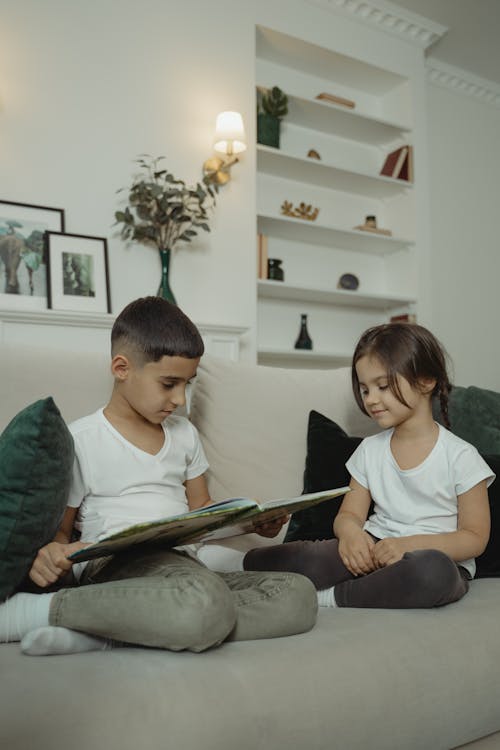 Kids Reading a Book Together 