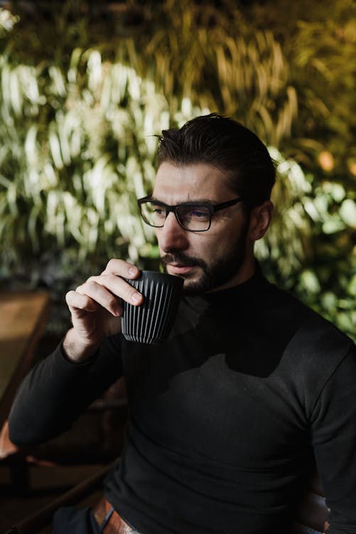 Man Drinking a Cup of Tea · Free Stock Photo