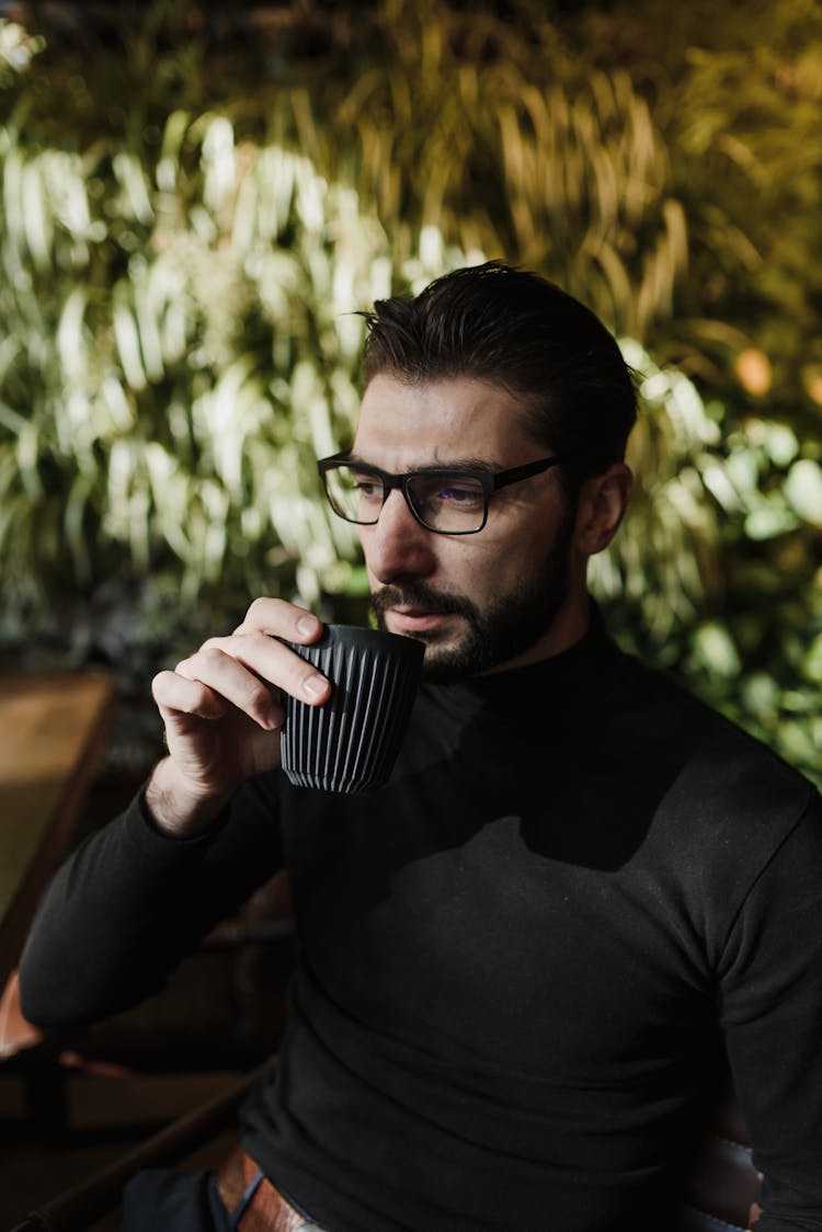 Man Drinking A Cup Of Tea