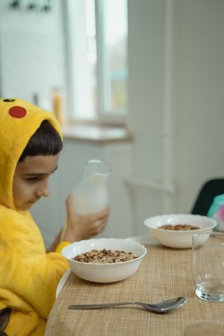 A Boy Looking His Breakfast