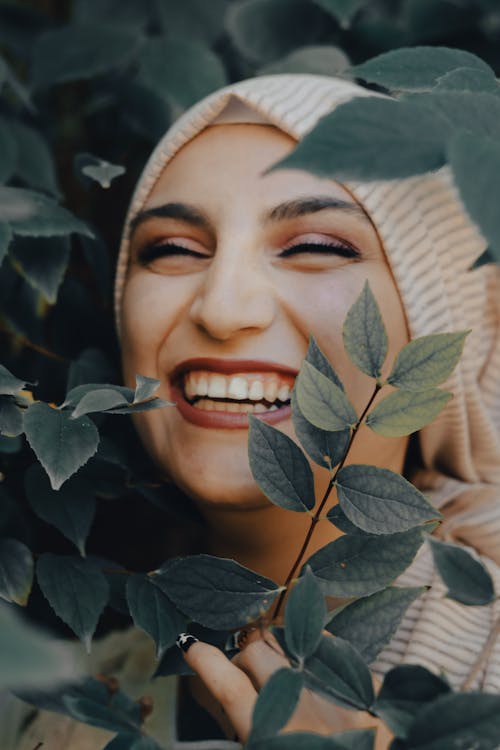 Woman in Beige Hijab Smiling