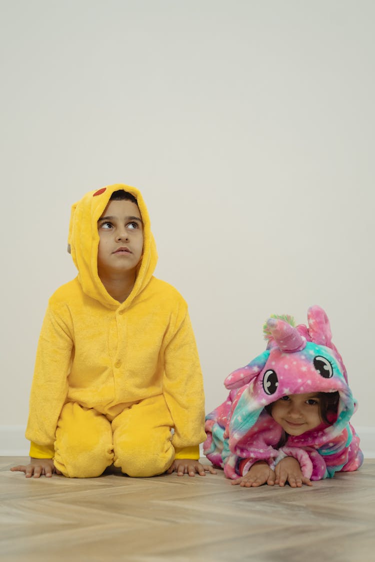 A Boy And Girl Wearing Costume 