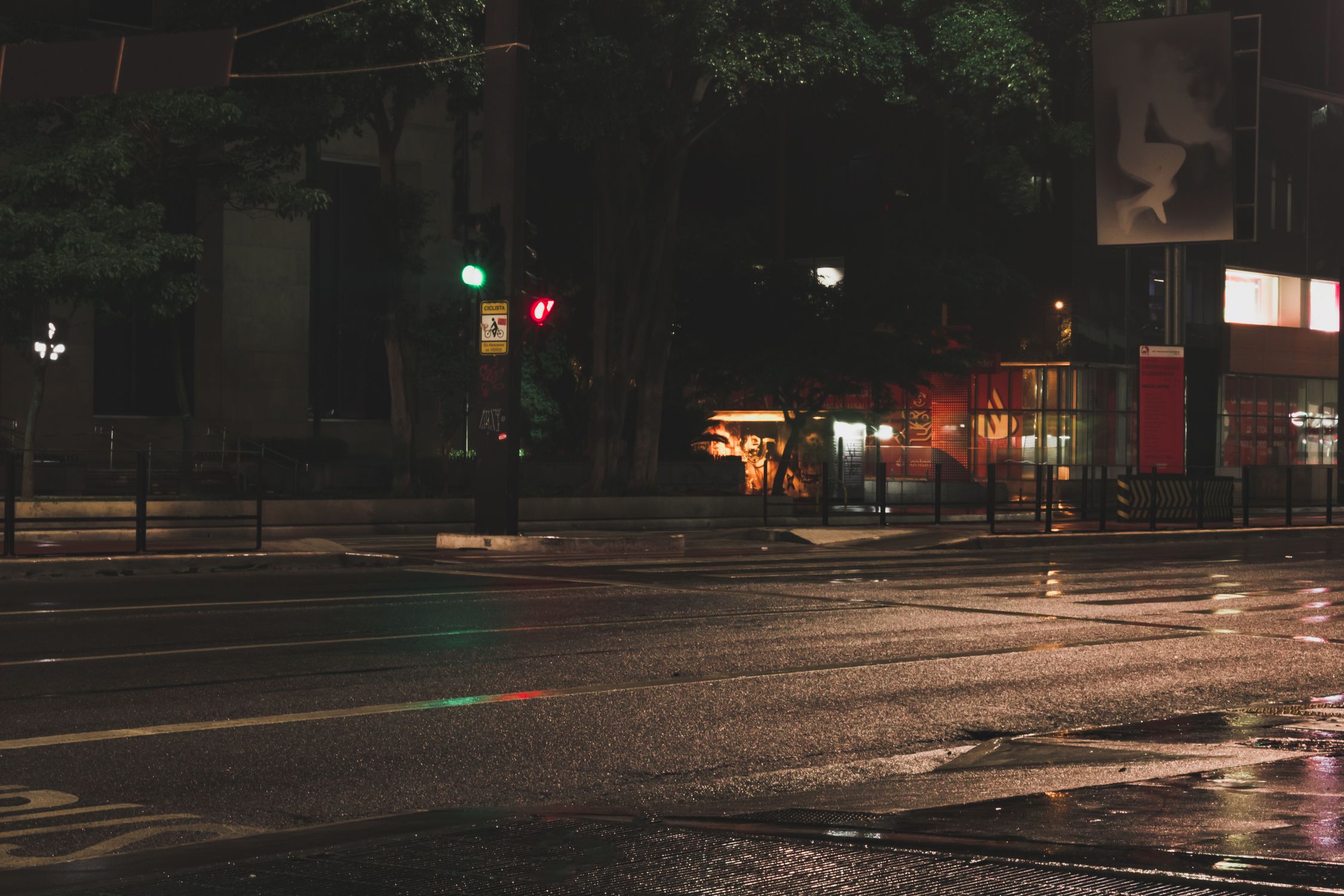 Illuminated empty road in big city at night · Free Stock Photo