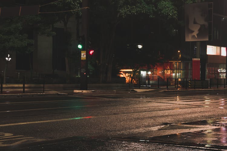 Illuminated Empty Road In Big City At Night