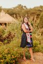 Delighted ethnic woman in sorority scarf