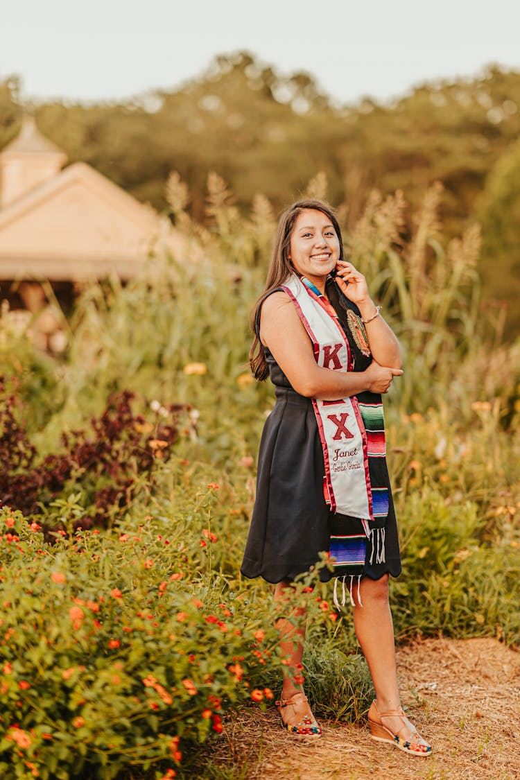 Delighted Ethnic Woman In Sorority Scarf