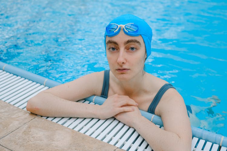 A Woman With Goggles In The Swimming Pool