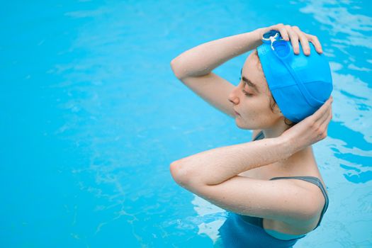 Woman Wearing Swimming Outfit in Pool