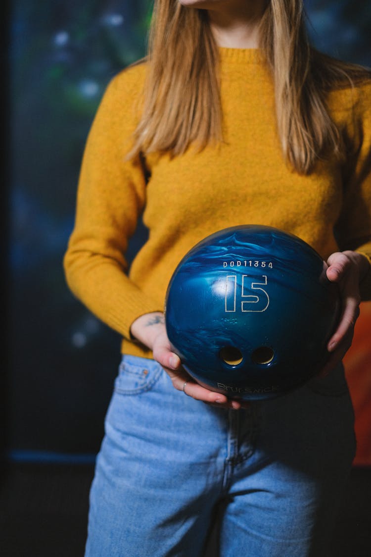 Woman Holding A Bowling Ball 