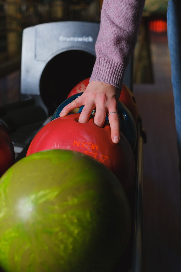 Person Taking Bowling Ball