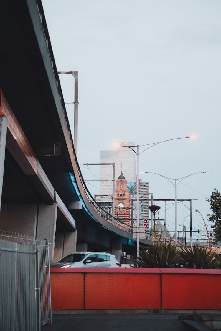 White Car Parked Near Building