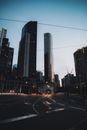 Cars on Road Near High Rise Buildings