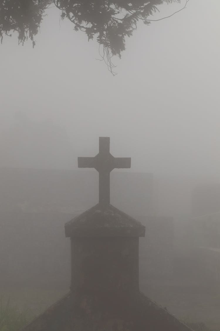 A Tombstone On A Cemetery