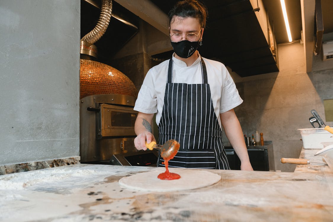 Chef Making a Pizza  