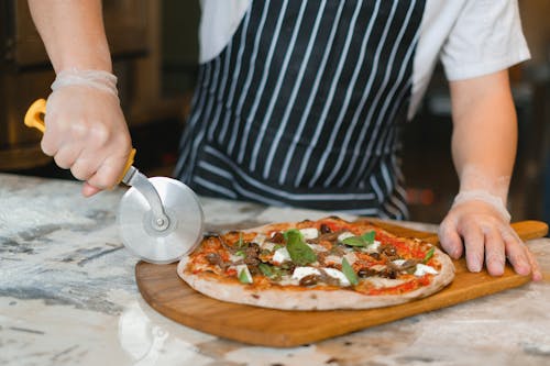 Fotos de stock gratuitas de comida, cortador de pizza, de cerca