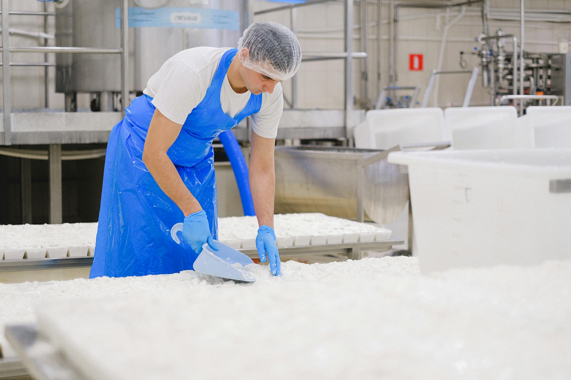 A Man Working in a Production Plant