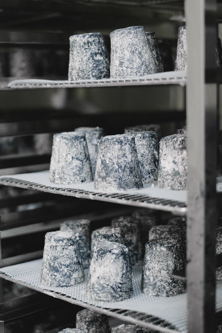 Aged Cheese On Shelves 