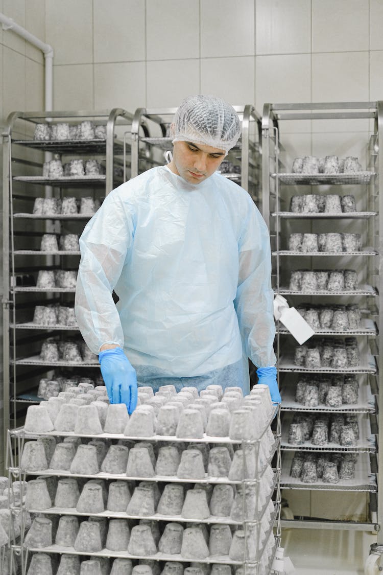 A Worker In A Storage Room