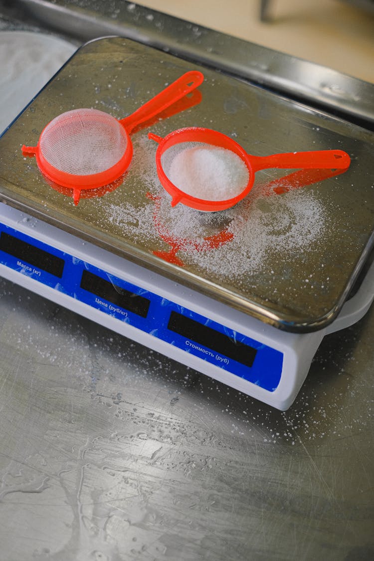 Flour In Sieve On Weighing Scale