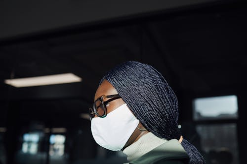 Free Person Wearing White Face Mask Stock Photo