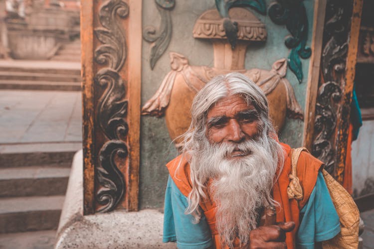 Elderly Hindu Man With Gray Beard In Town