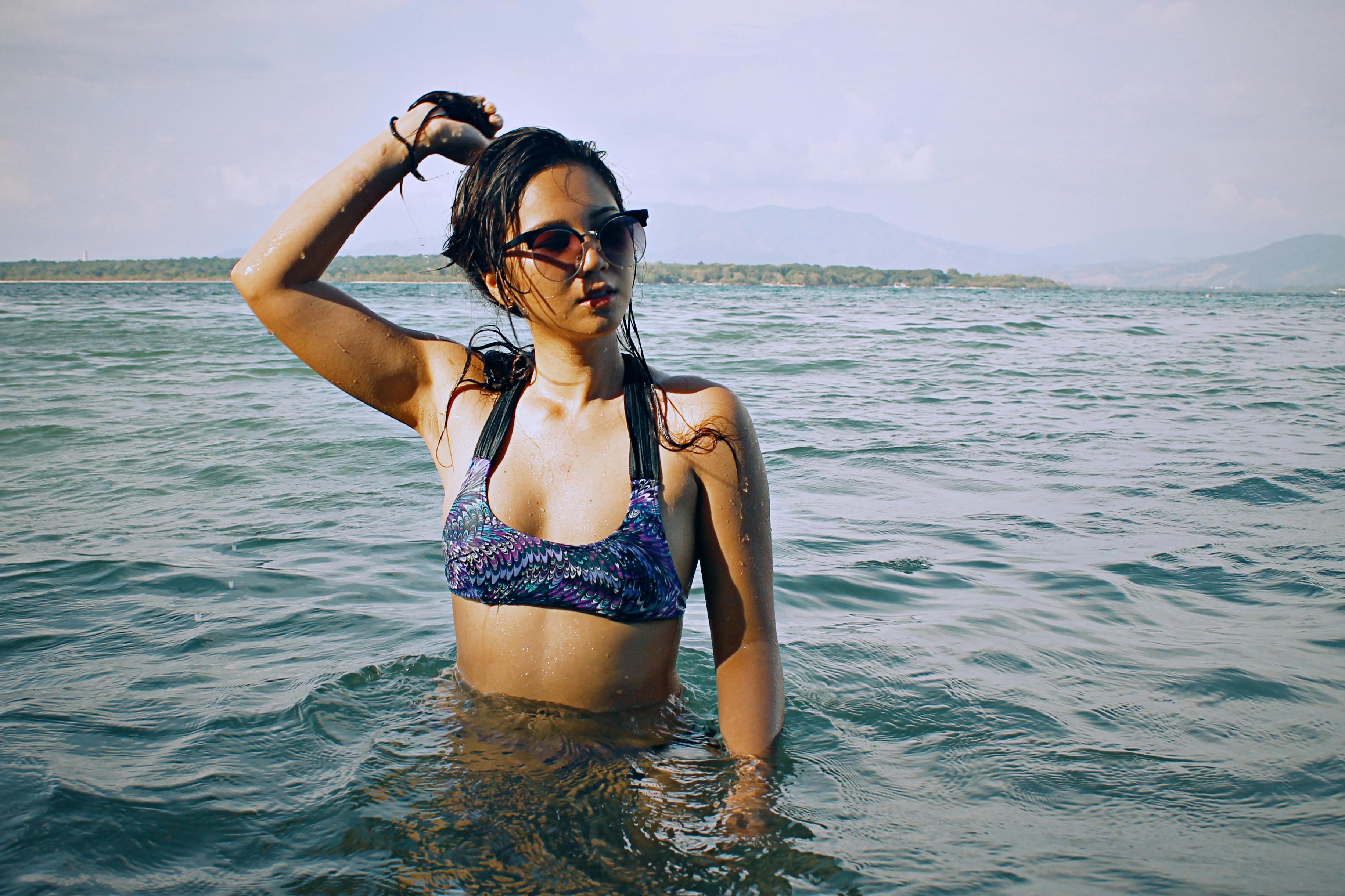 Young Woman With Athletic Body In Bikini On The Beach Stock Photo, Picture  and Royalty Free Image. Image 170876344.