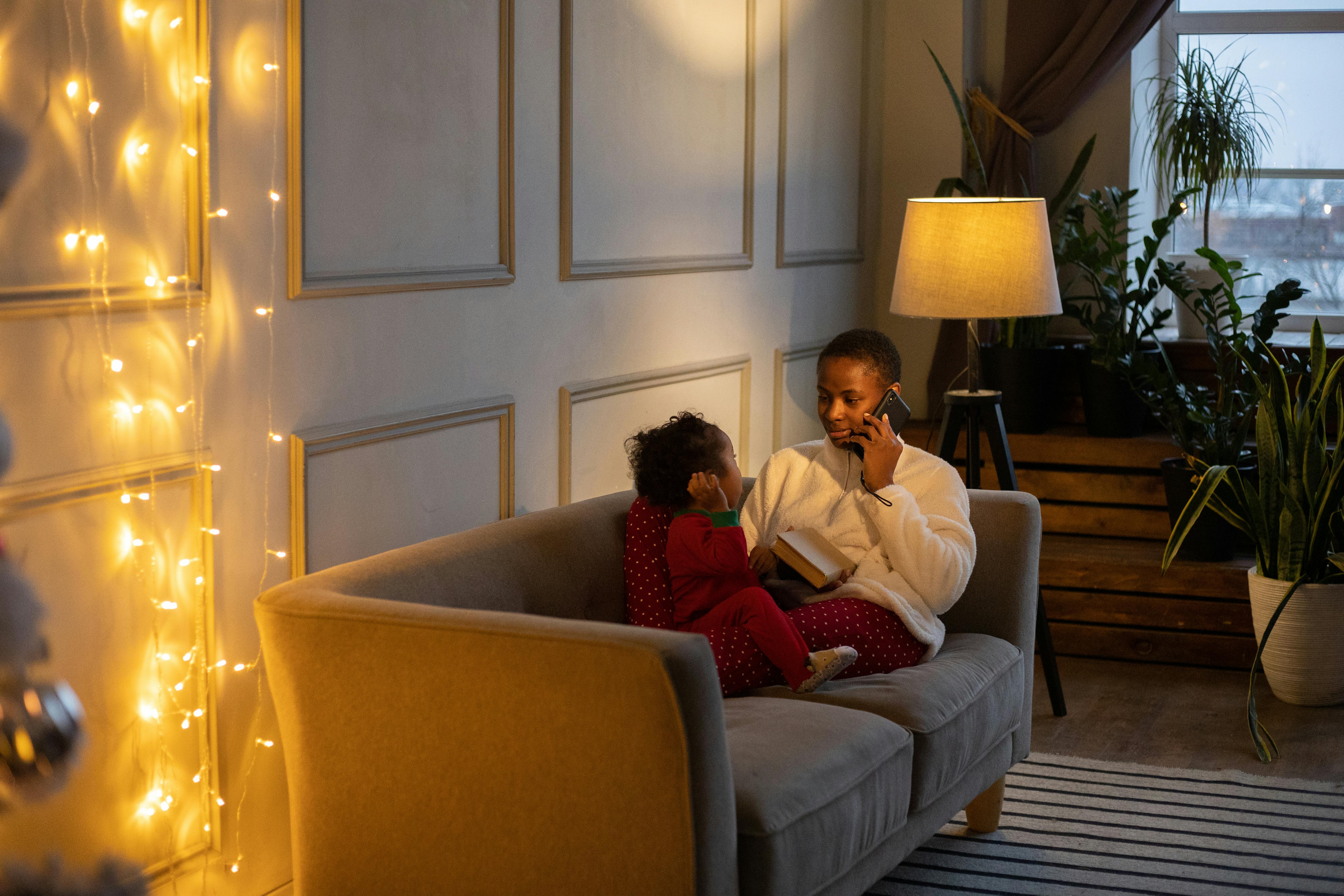 parent on phone booking hotel accommodation
