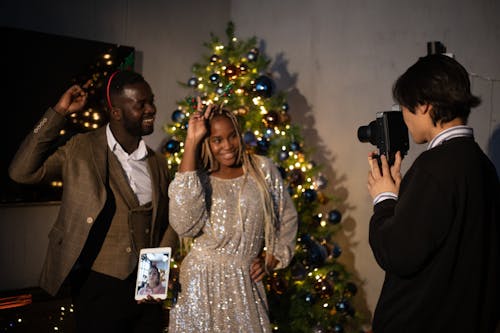 Man And Woman Posing For A Photo