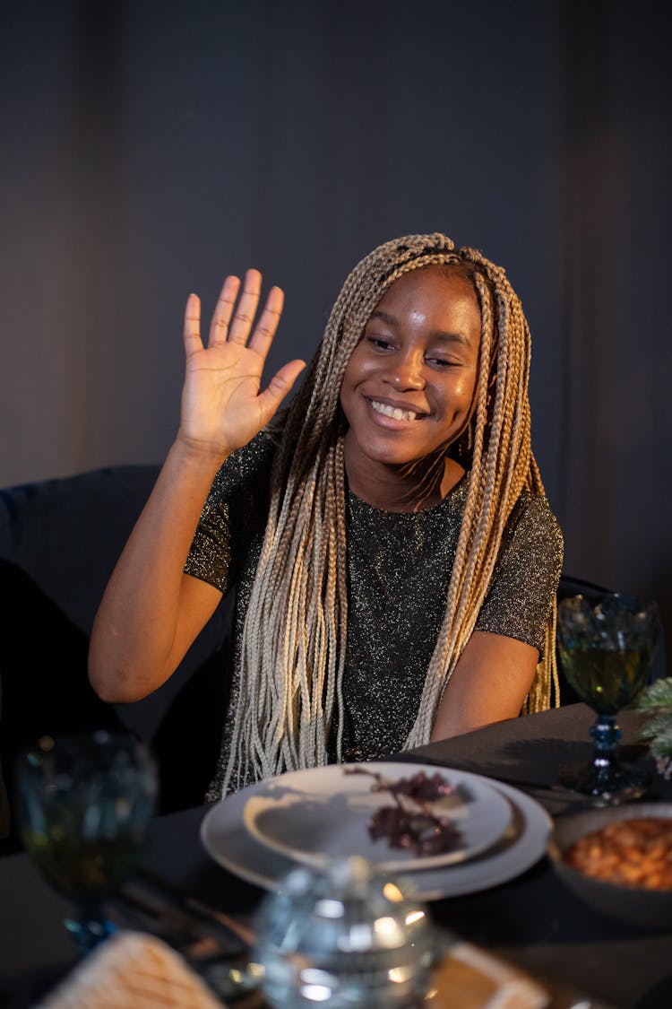 Woman Raising Her Hand