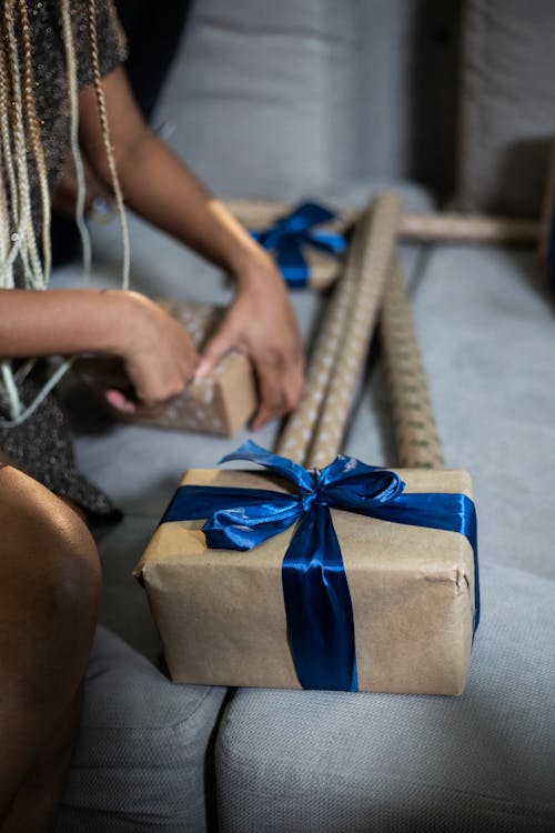 Free Brown Gift Box With Blue Ribbon Stock Photo
