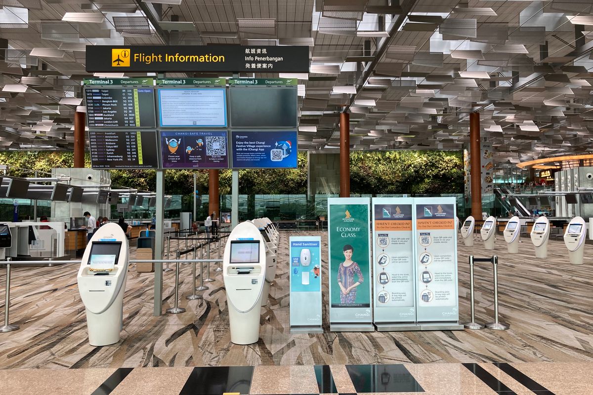 Flight information displays and check in kiosks in a modern airport