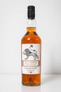 White and Brown Labeled Bottle