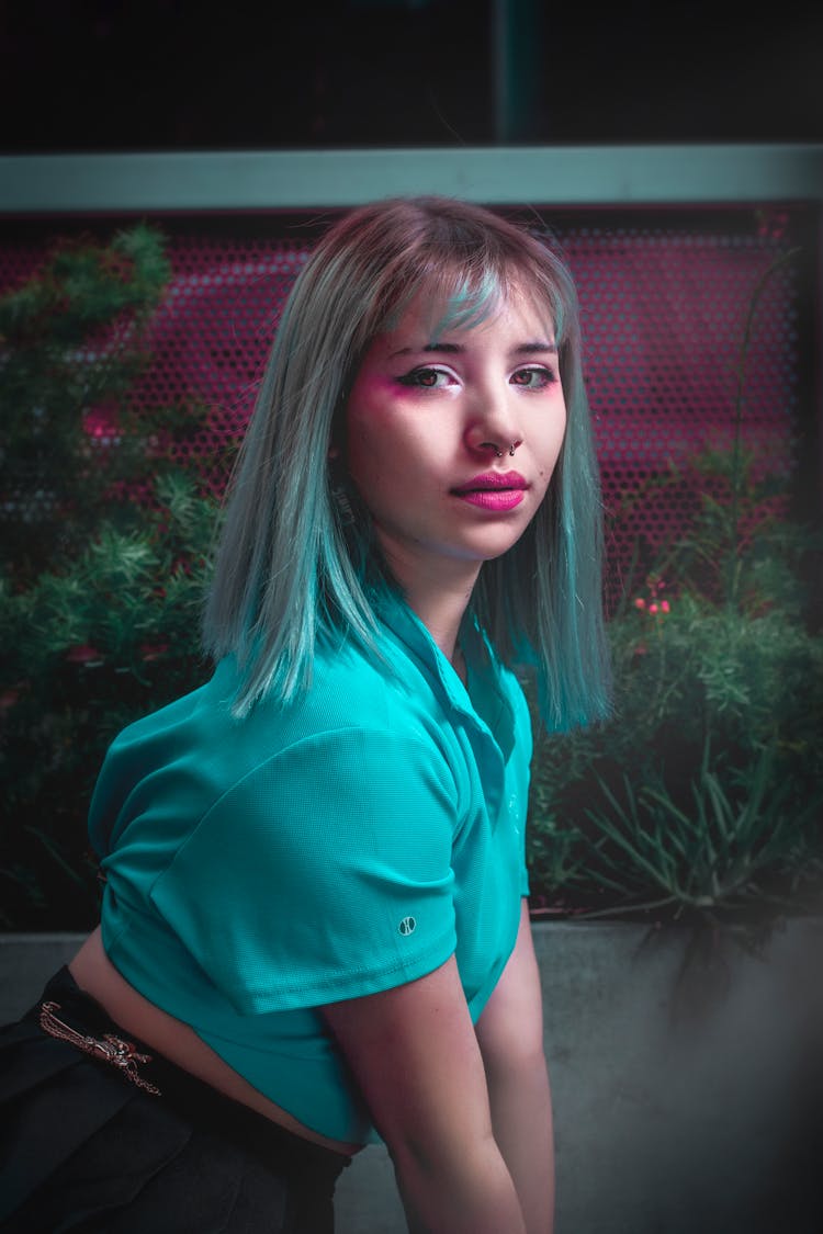 Woman In Blue Shirt With Blue Hair Color