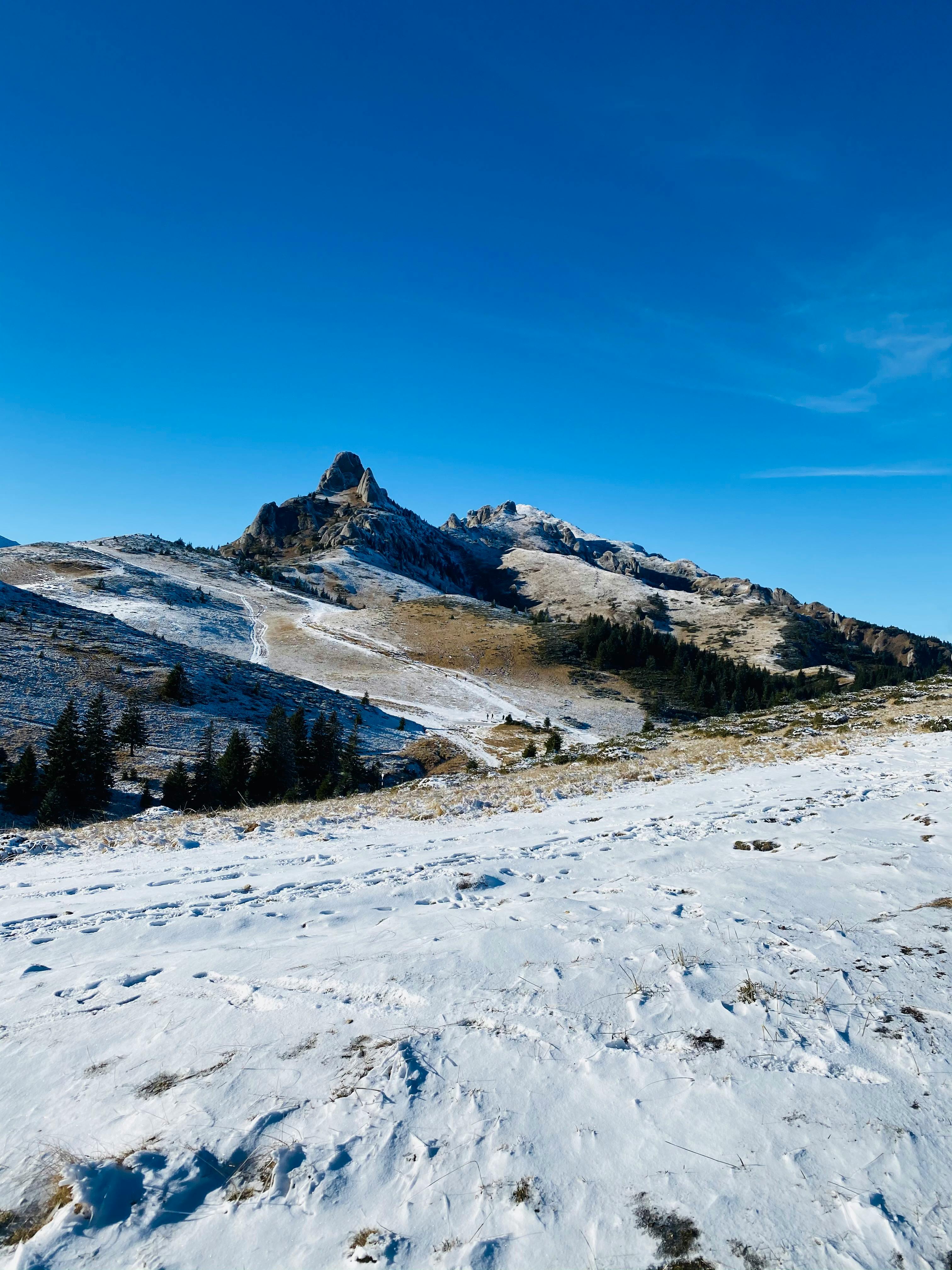 Prescription Goggle Inserts - Scenic snow-covered mountain landscape with bright blue sky, perfect for nature enthusiasts.