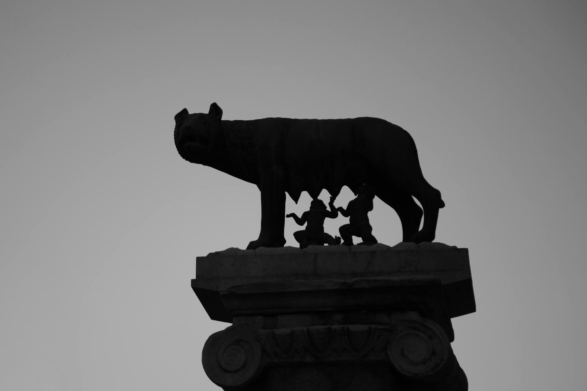 Ancient sculpture of mythical Romulus and Remus